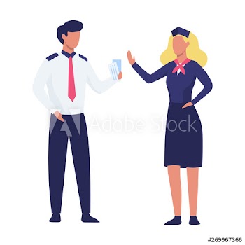 Pilot and stewardess standing in the uniform