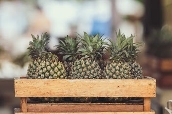 Pineapple Fruits on Wooden Crate