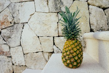Pineapple on White Stairs