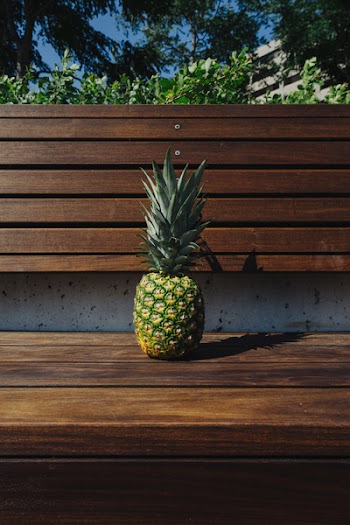 Pineapple on Wooden Bench