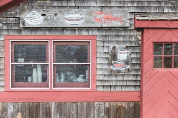 pink and gray wooden cafe front
