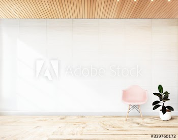 Pink chair in a white room