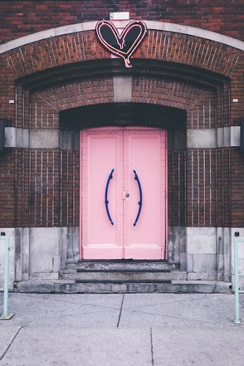 Pink Church Doors With Neon Hard Above