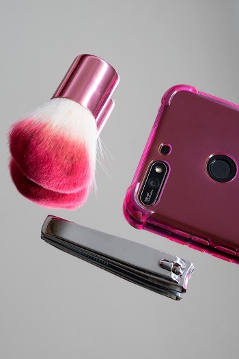 Pink Makeup Brush And Stainless Steel Nail Clipper