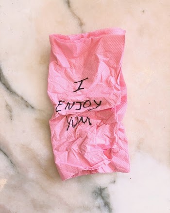 Pink Napkin With Written Text