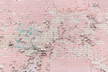 Pink Paint Peeling Off Brick Wall Texture