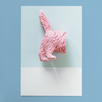 Pink Pinata Animal Body on Teal and White Surface