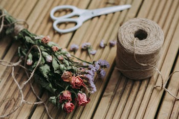 Pink Roses Bouquet Beside White Scissors