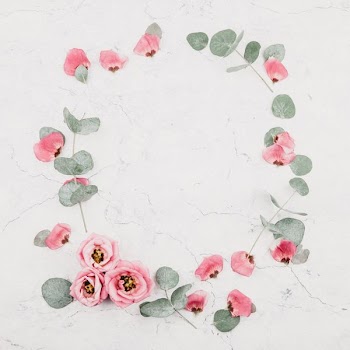 pink roses on white marble surface
