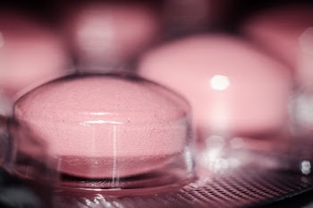 Pink Round Medication Pill