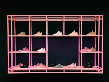 Pink Shoe Rack With Assorted-color-and-style Shoes