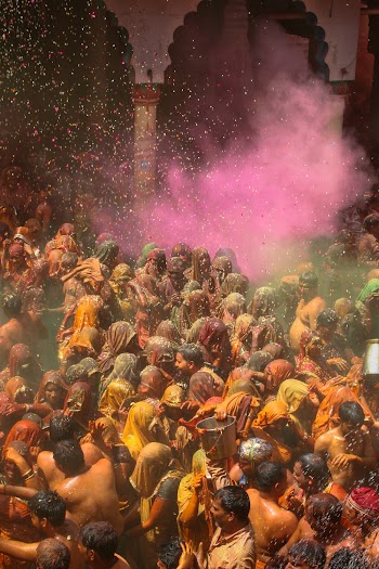 Pink Smoke Beside Wet People