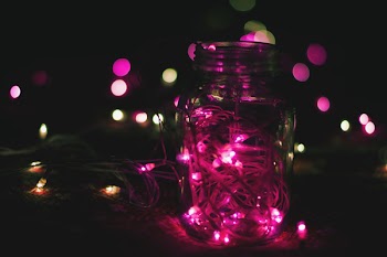 Pink String Lights on Clear Glass Mason Jar