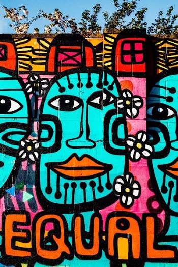 pink, teal, and orange graffiti wall art