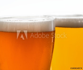 Pints of draught beer macro photography