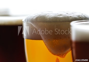 Pints of draught beer macro photography