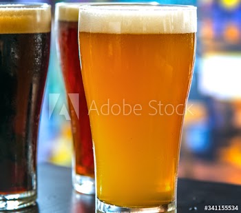 Pints of draught beer macro photography
