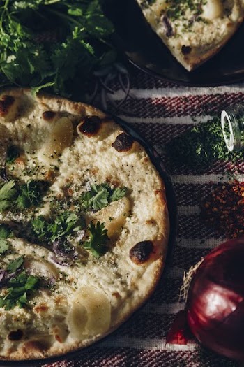 Pizza And Toppings On Cloth