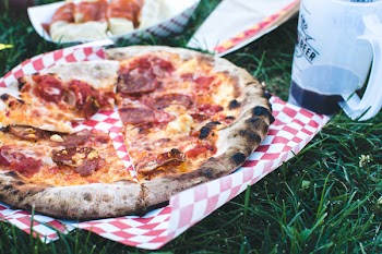 Pizza Salami on a grass 