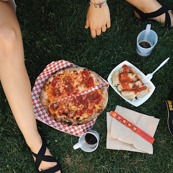 Pizza Salami on a grass 
