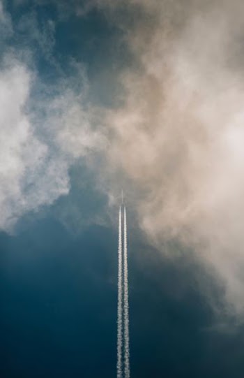 plane blowing gas on air