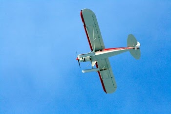 plane flying through the sky