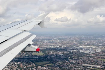 Plane on Air Under Cloudy Sky