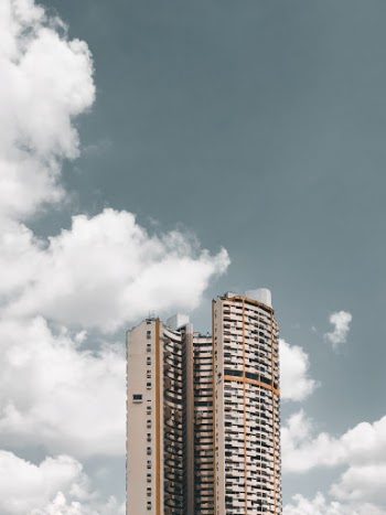 Plans are underway to redevelop this uniquely shaped residential building after being collectively sold early last year.
