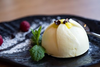 Plate of Dessert on Brown Surface