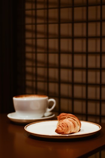 Plated Bread on Brown Wooden Table
