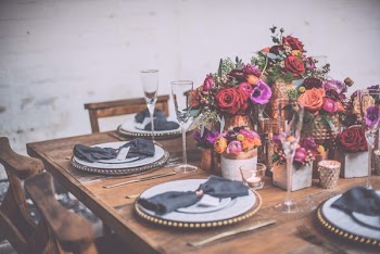 Plates And Footed Glasses On Table