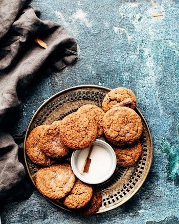 platter of cookies on top of blue surface