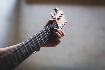 Playing Acoustic Guitar