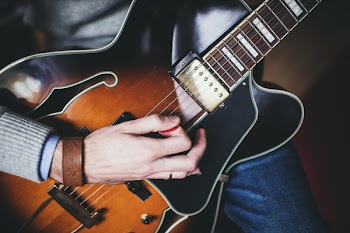 Playing guitar – front shot