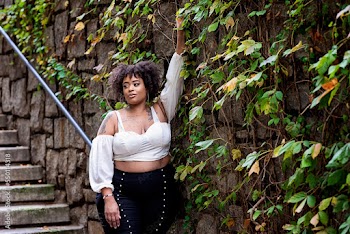 Plus size fashion forward Black woman outside 