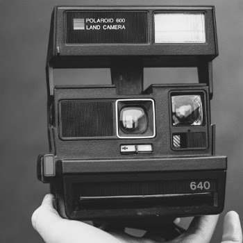 Polaroid Land Camera Grayscale Photo