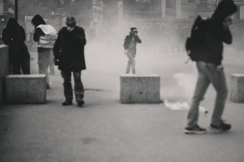 Police fires tear gas at Yellow Vest demonstrators during the 25th weekend of protests in the streets of Lyon, France.

Police violence is at its highest since the 1950s. There is an extensive use of tear gas, sting-ball grenades and LBDs ("defense ball launchers") against largely peaceful protesters. According to official numbers, as of now, 1.428  tear gas grenades and 13.460 rubber balls and have been fired during yellow vests protests.
As of now (May 5th), 23 persons lost an eye and 5 persons their hand during protests (source: mediapart.fr, http://tiny.cc/6hd85y).