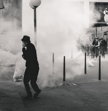 Police fires tear gas at Yellow Vest demonstrators during the 25th weekend of protests in the streets of Lyon, France.

Police violence is at its highest since the 1950s. There is an extensive use of tear gas, sting-ball grenades and LBDs ("defense ball launchers") against largely peaceful protestors. According to official numbers, as of now, 1.428  tear gas grenades and 13.460 rubber bullets have been fired.
As of now (May 5th, 2019), 23 persons lost an eye and 5 persons their hand during protests (source: mediapart.fr, http://tiny.cc/6hd85y).