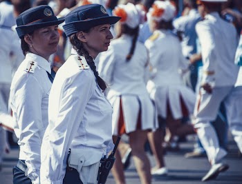 Police Woman Waling in Street