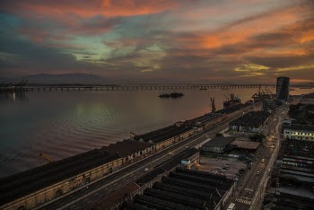 Port Near Body of Water during Sunset
