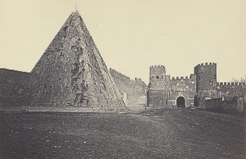Porta St. Paolo with Pyramid | Free Photo - rawpixel