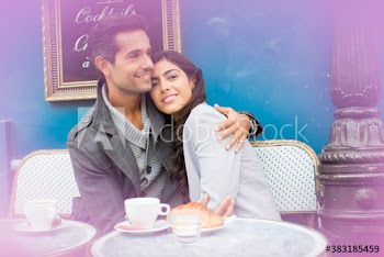 Portrait affectionate couple enjoying coffee at sidewalk cafe, Paris