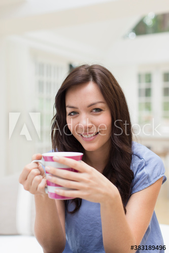 Portrait beautiful young woman drinking coffee on patio