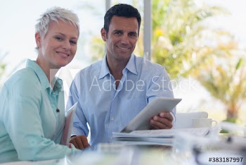 Portrait confident business people with digital tablet