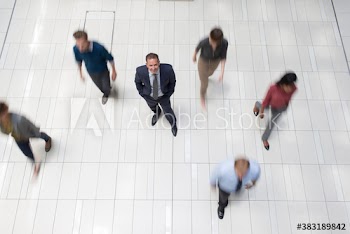 Portrait confident businessman in corridor