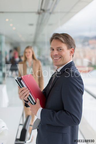 Portrait confident businessman in office