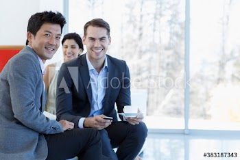 Portrait confident businessmen with coffee