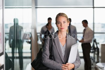 Portrait confident businesswoman in conference room