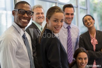 Portrait confident corporate business people in meeting