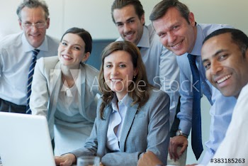 Portrait confident corporate business people in meeting